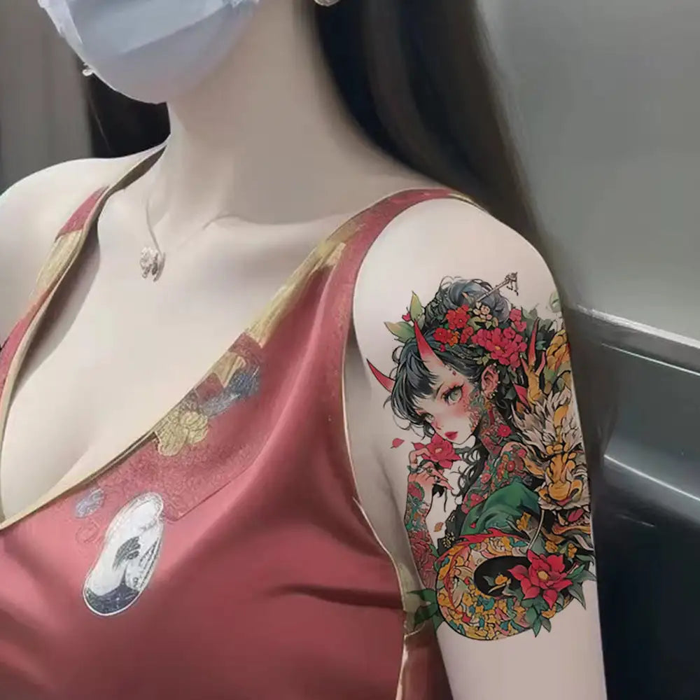 Floral tattoo design on arm inspired by Dragon Empress small tattoo sticker