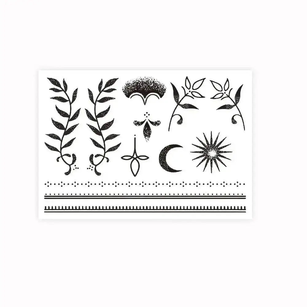 Black temporary tattoo sticker sheet with nature and celestial designs for Moon’s Kiss