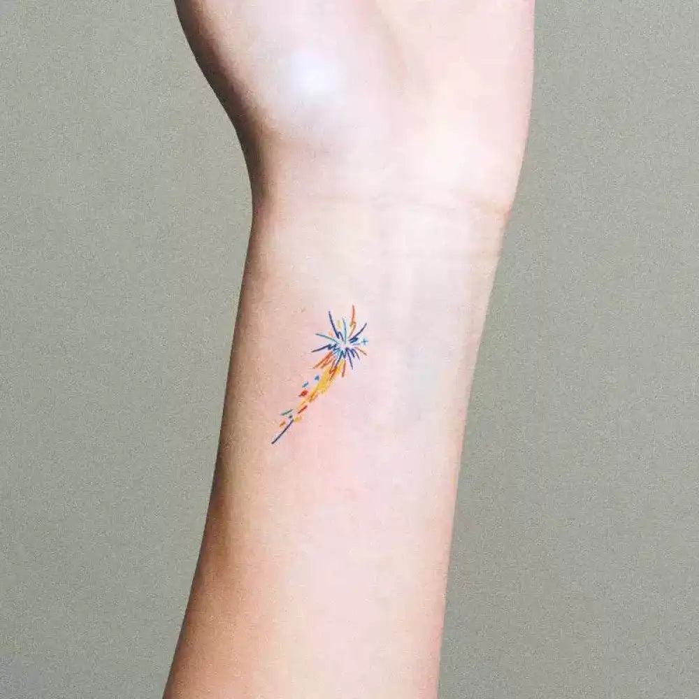 Colorful minimalist shooting star small tattoo sticker on wrist, 1x1cm temporary design