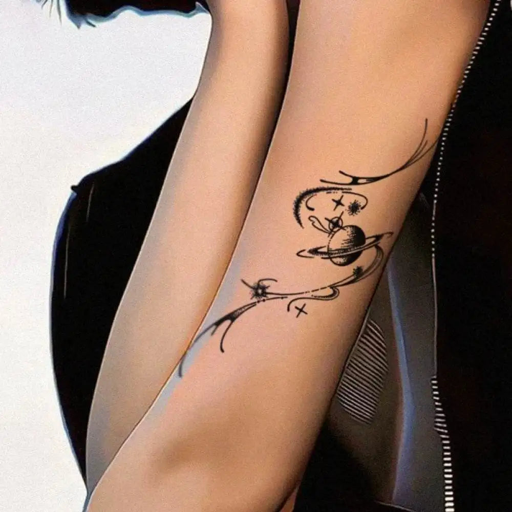 Cosmic Starry Sky tattoo sticker featuring Saturn, stars, and swirling abstract lines