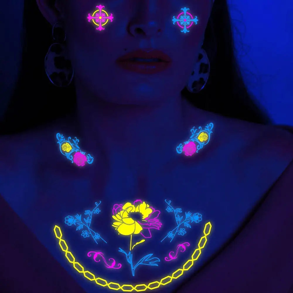Person with glowing Dark Graffiti GZ fluorescent temporary tattoos on face, neck, chest