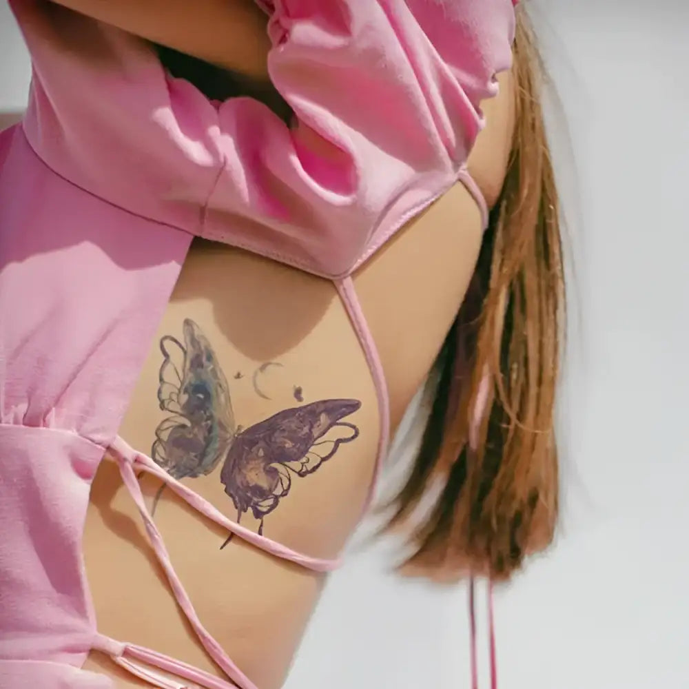 Iridescent Chrysalis tattoo sticker featuring a butterfly design with advanced hand-drawn artistry