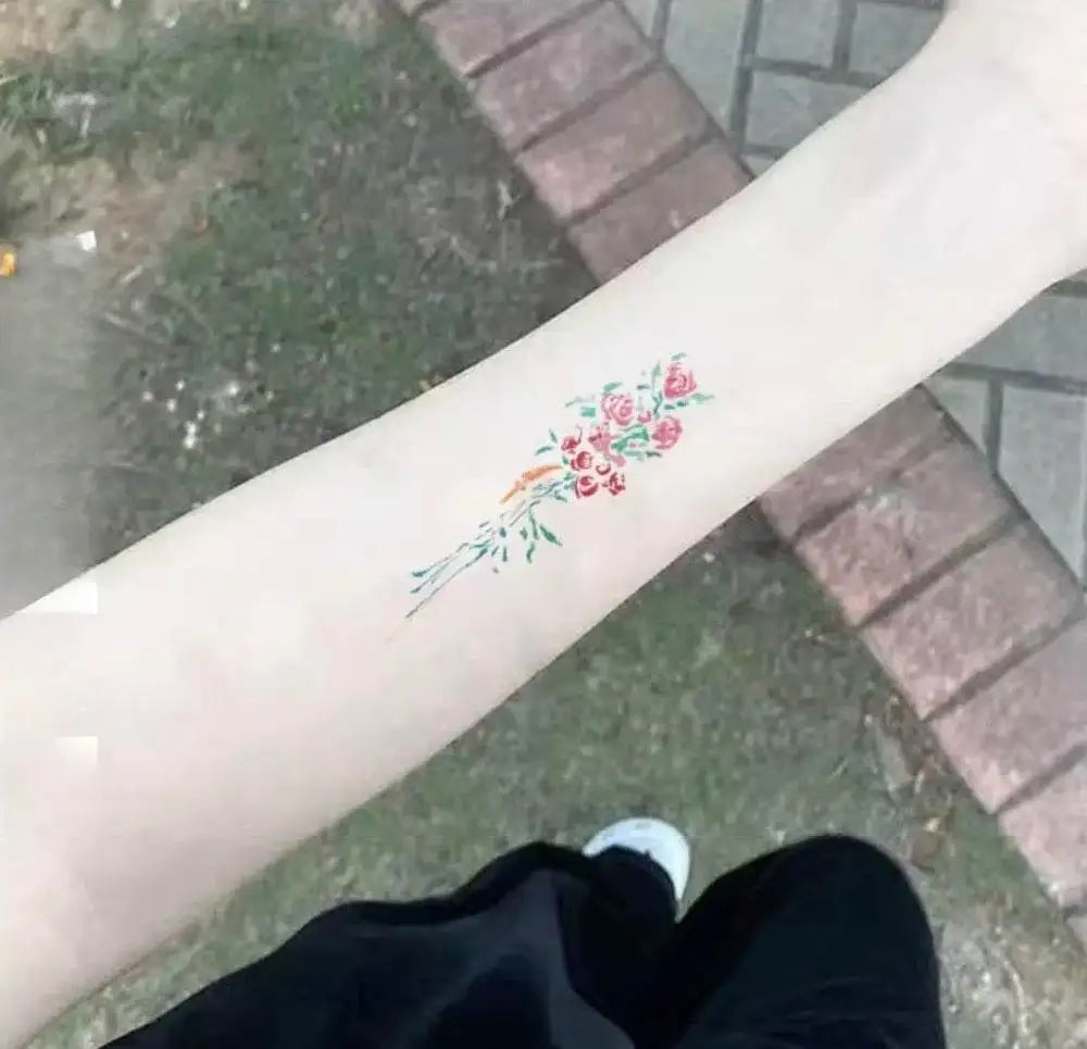 Luna Bloom floral tattoo sticker on arm with vibrant colors, highly rated in real reviews