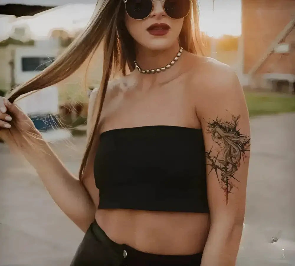 Ribbon Goddess ribbed crop top with floral temporary tattoo design