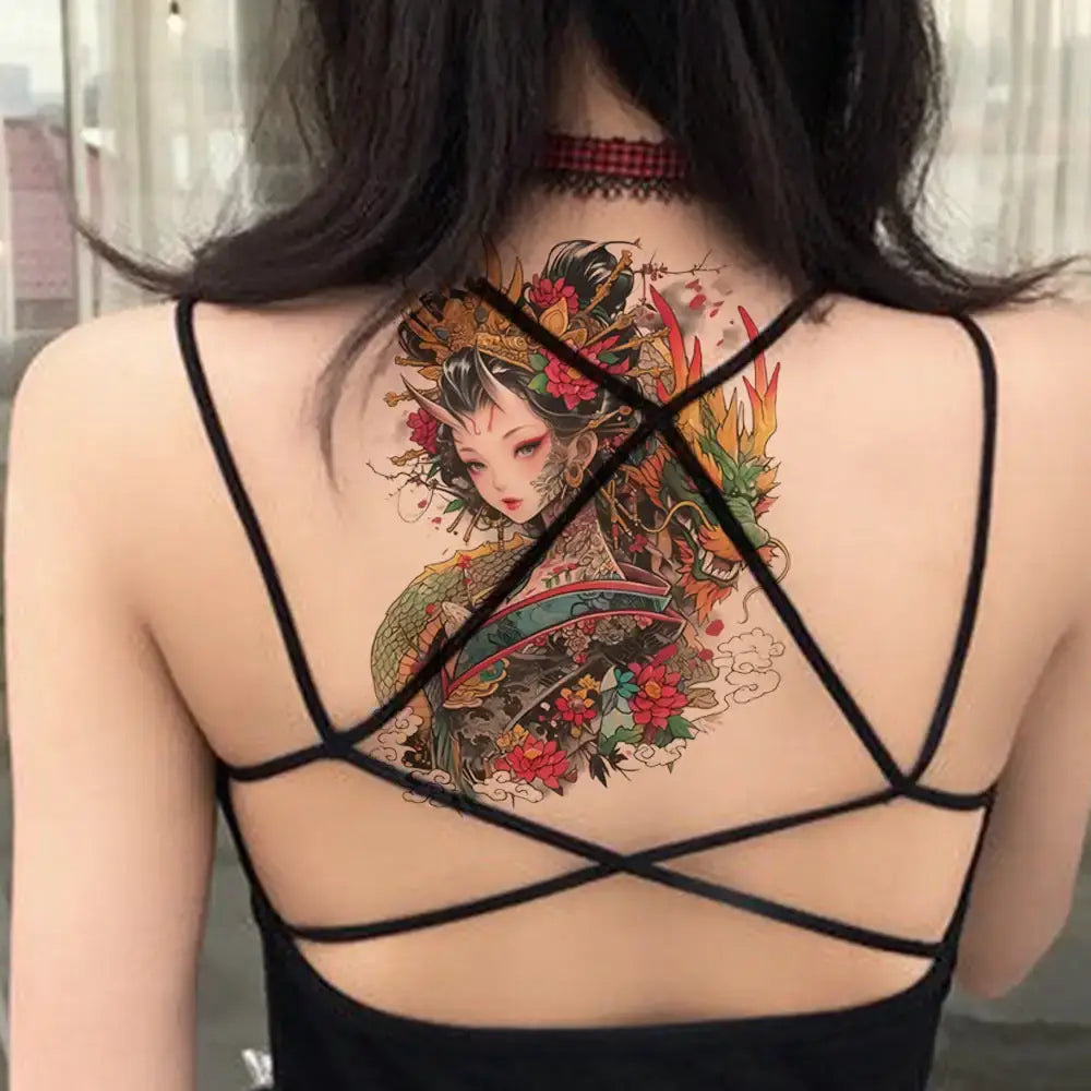 Floral tattoo design on back of woman’s black dress with crisscross straps, ideal as a tattoo sticker or small tattoo