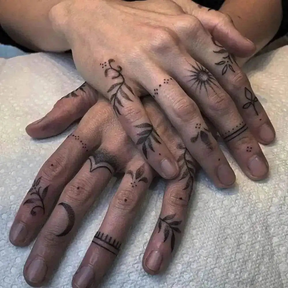 Temporary tattoo sticker with delicate black finger tattoos, highly rated in real reviews