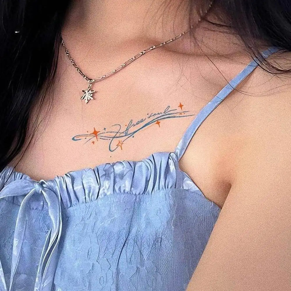 Free soul temporary tattoo with stars on womans chest, 8.2 x 2.3 cm