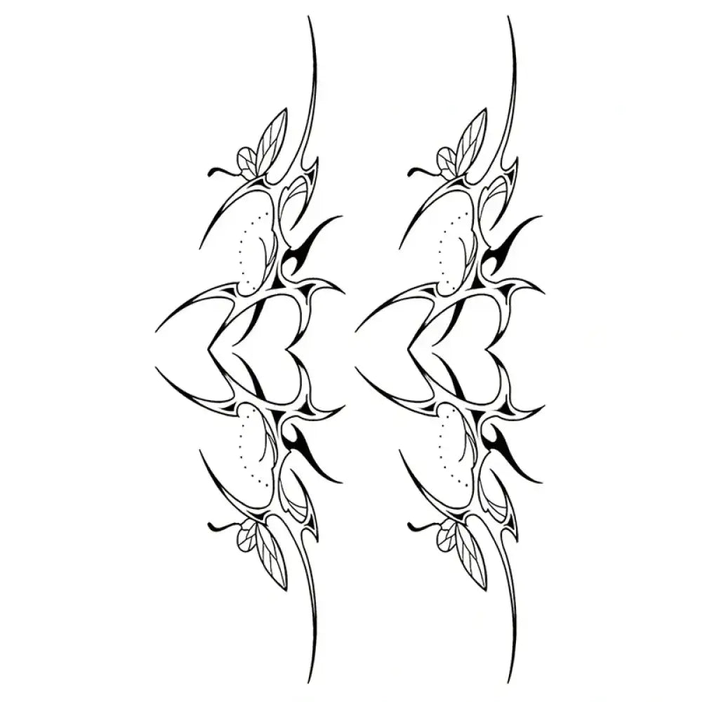 Symmetrical heart vine tribal tattoo designs with heart and leaf motifs